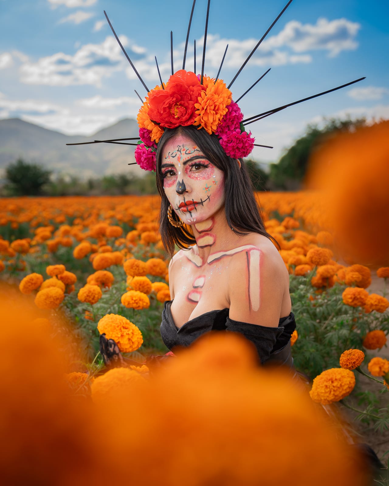 Retrato de catrina entre flores de cempasúchil